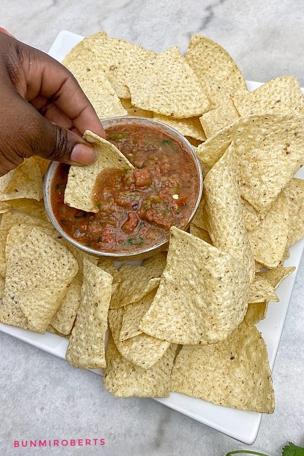 tortilla chip with salsa in a bowl
