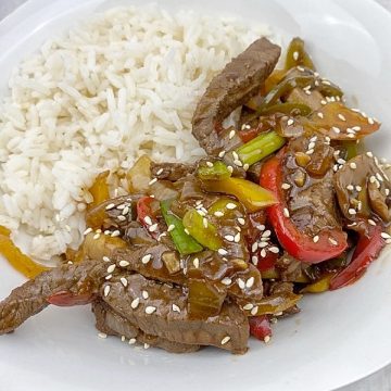 beef and mushroom stir fry served with rice