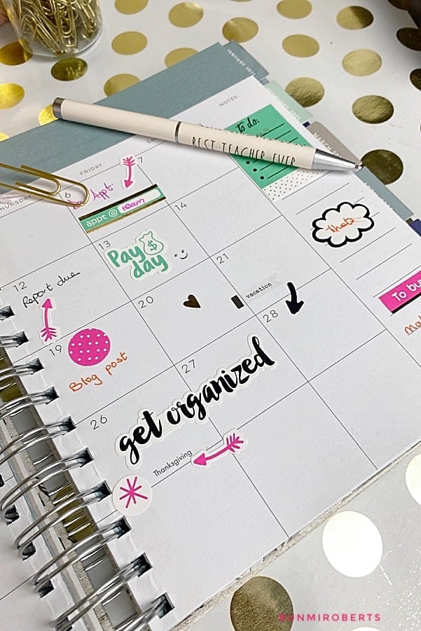 a planner opened to the month calendar page